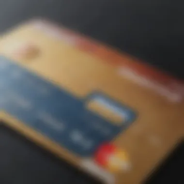 A debit card resting on a credit card statement